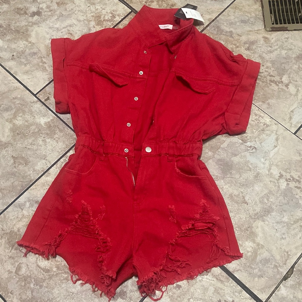 Cute size small red  button up romper, it's perfect for a date, or a concert!